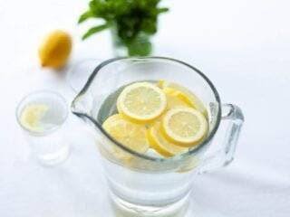 Drinking Lukewarm Water with Lemon Meaning Benefits Pros Advantages Limitations Cons and Disadvantages for Coronavirus (Covid-19) Photo